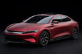 Ultra Matte Chrome Romani Red PET vinyl wrap film on a car, front three-quarter studio view
