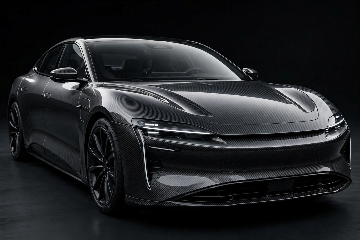 6DUltra Carbon Fiber Black Silver PET vinyl wrap film on a car, front three-quarter studio view