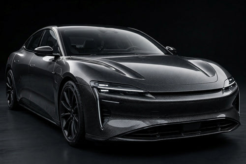 6DUltra Carbon Fiber Black Silver PET vinyl wrap film on a car, front three-quarter studio view