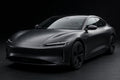 Matte Metallic Black PET vinyl wrap film on a car, front three-quarter studio view