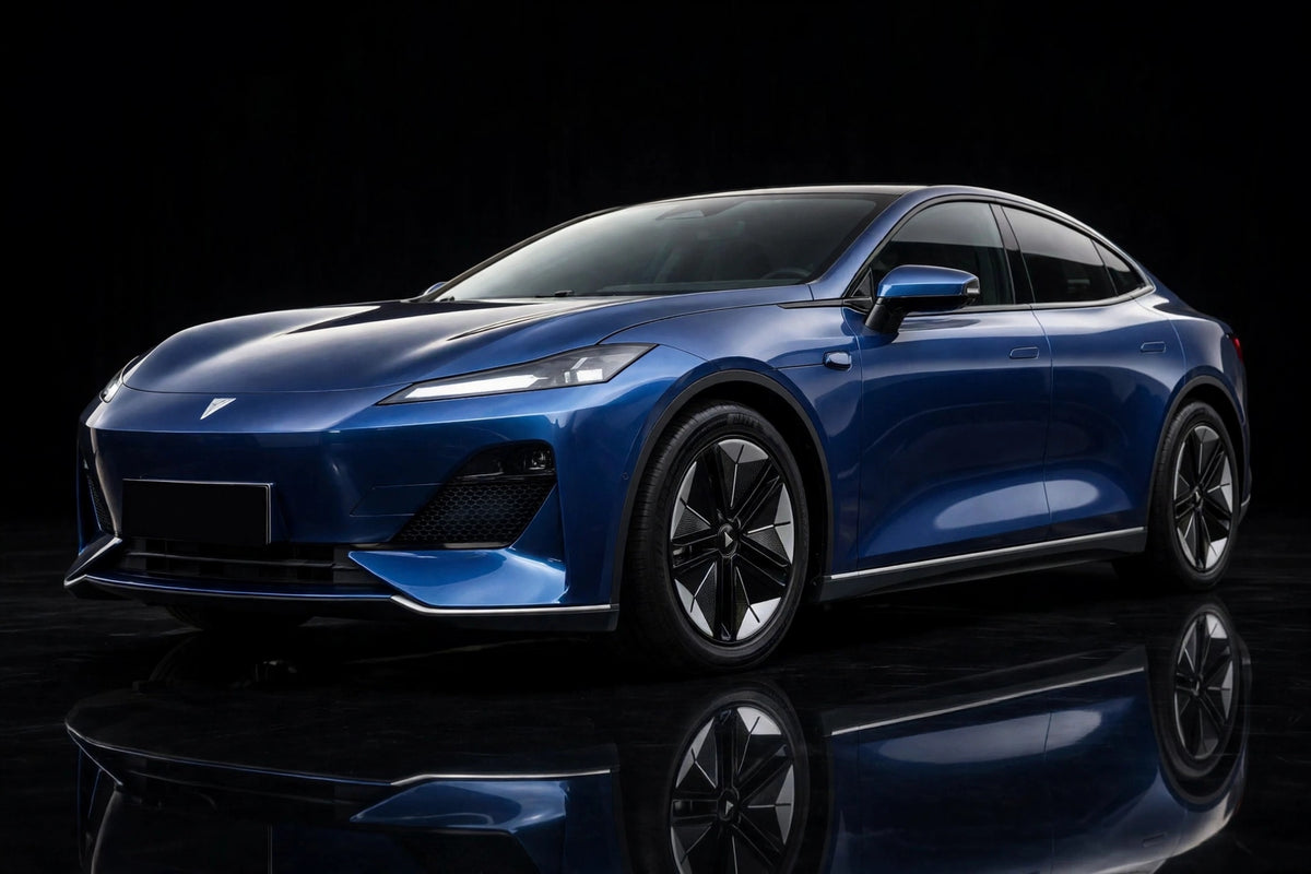 Super Gloss Galaxy Blue Metallic PET vinyl wrap film on a car, front three-quarter studio view