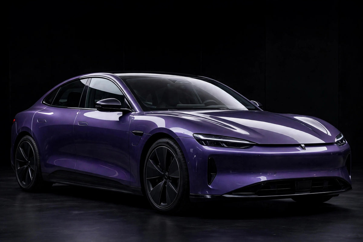 Super Gloss Rosemary Violet PET vinyl wrap film on a car, front three-quarter studio view
