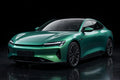 Super Gloss Coral Jade Greenr PET vinyl wrap film on a car, front three-quarter studio view