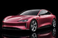 Super Gloss Morganite Red Metallic PET vinyl wrap film on a car, front three-quarter studio view