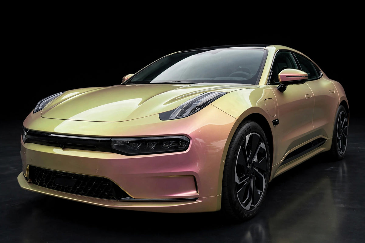 Super Gloss Lemon Honey PET vinyl wrap film on a car, front three-quarter studio view