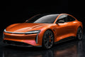 Phantom Flare Racing Orange PET vinyl wrap film on a car, front three-quarter studio view