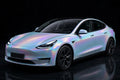 Super Gloss Iridescent Psychedelic Powder Blue PET vinyl wrap film on a car, front three-quarter studio view