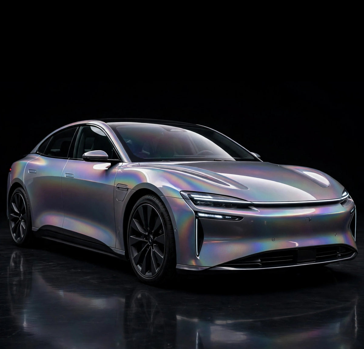 Super Gloss Iridescent Psychedelic Gray PET vinyl wrap film on a car, front three-quarter studio view
