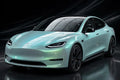 Super Gloss Dream Turquoise Green PET vinyl wrap film on a car, front three-quarter studio view