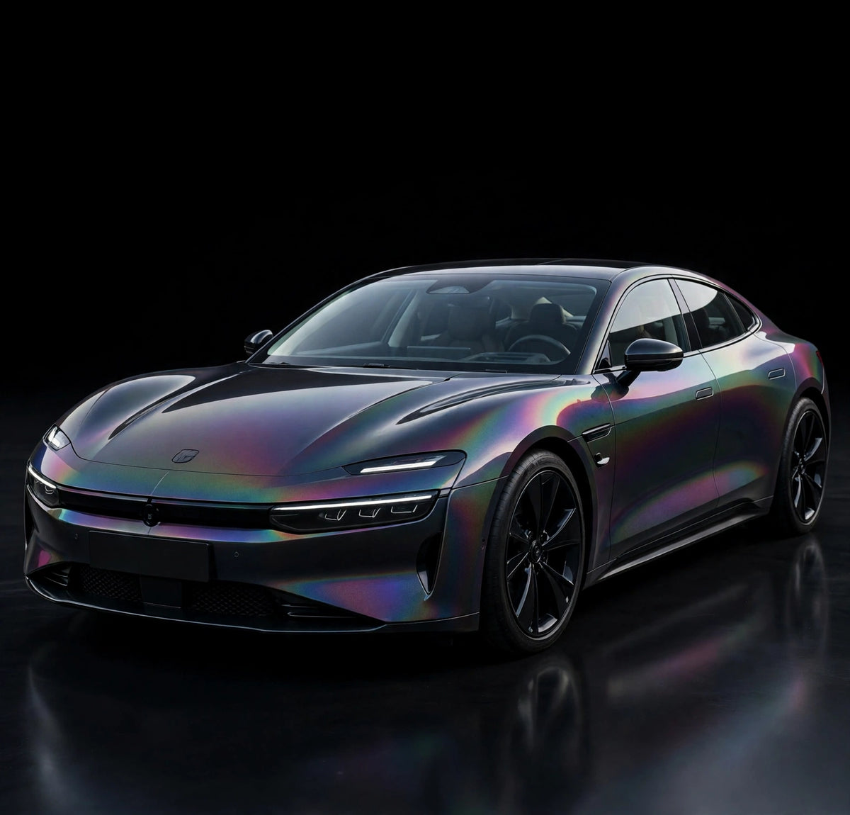 Super Gloss Iridescent Psychedelic Black PET vinyl wrap film on a car, front three-quarter studio view