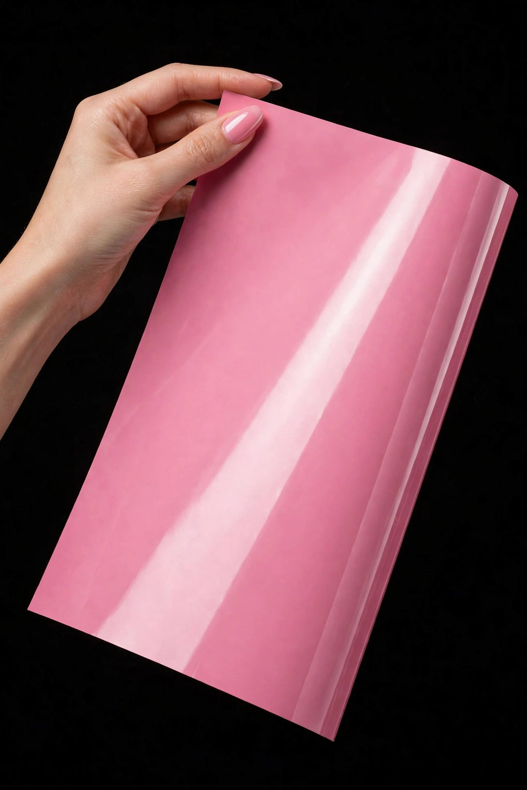 Super Gloss Morganite Red vinyl wrap film sheet held in hand