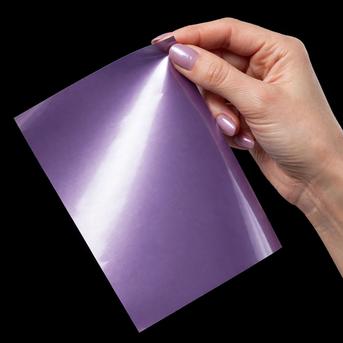 Super Gloss Midsummer Violet vinyl wrap film sheet held in hand