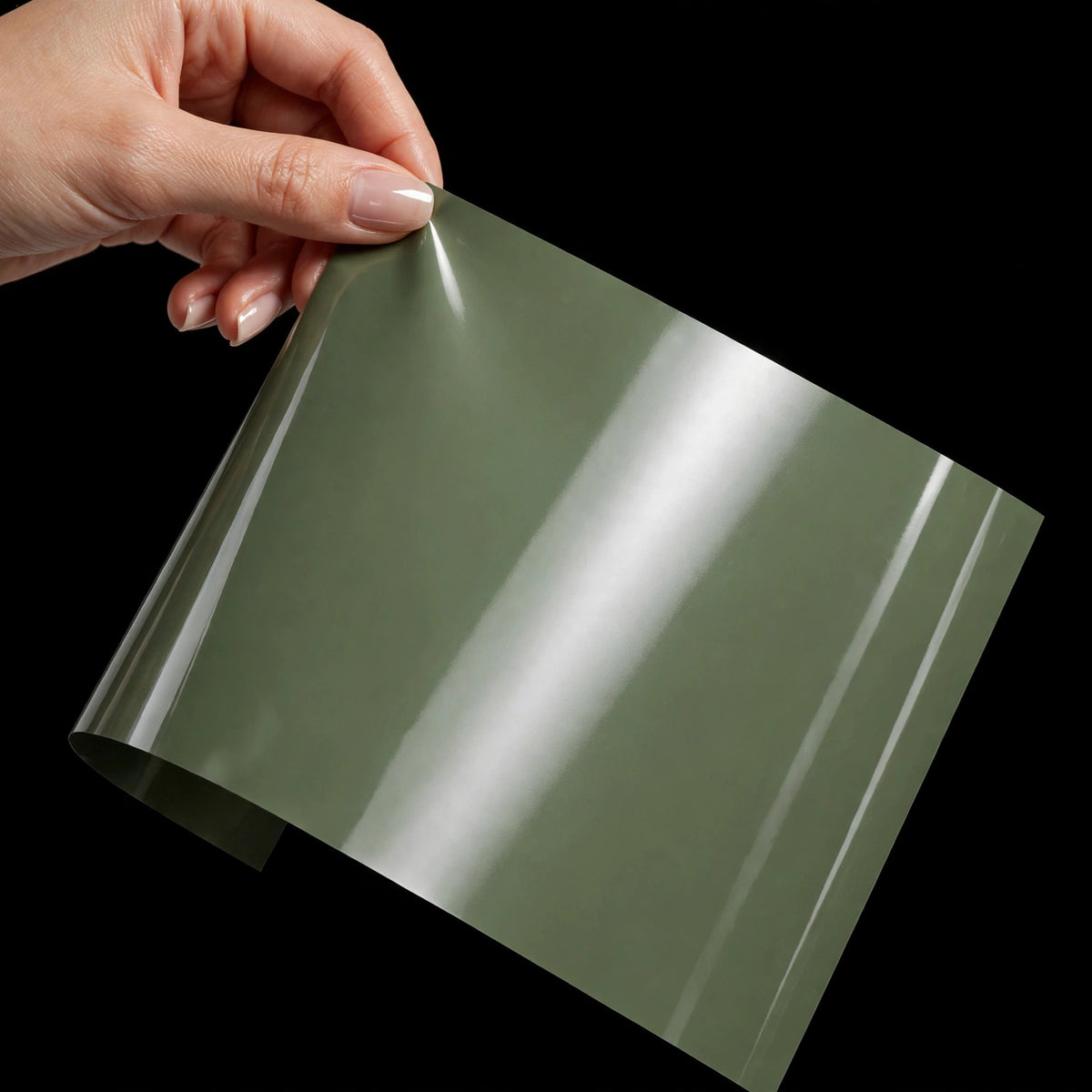 Super Gloss Army Green vinyl wrap film sheet held in hand