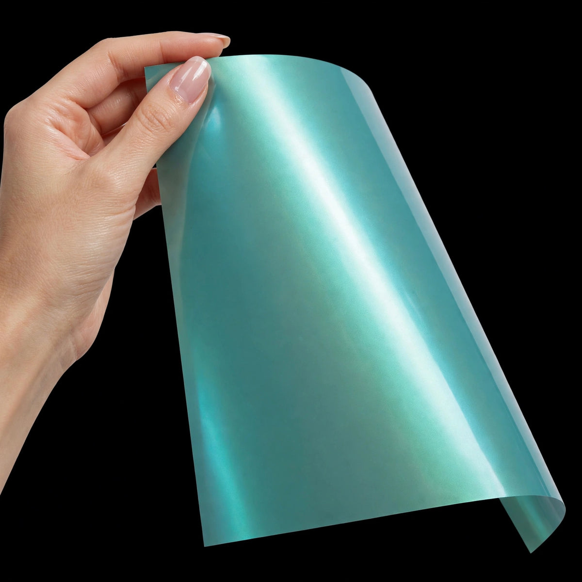 Super Gloss Dream Turquoise Green vinyl wrap film sheet held in hand