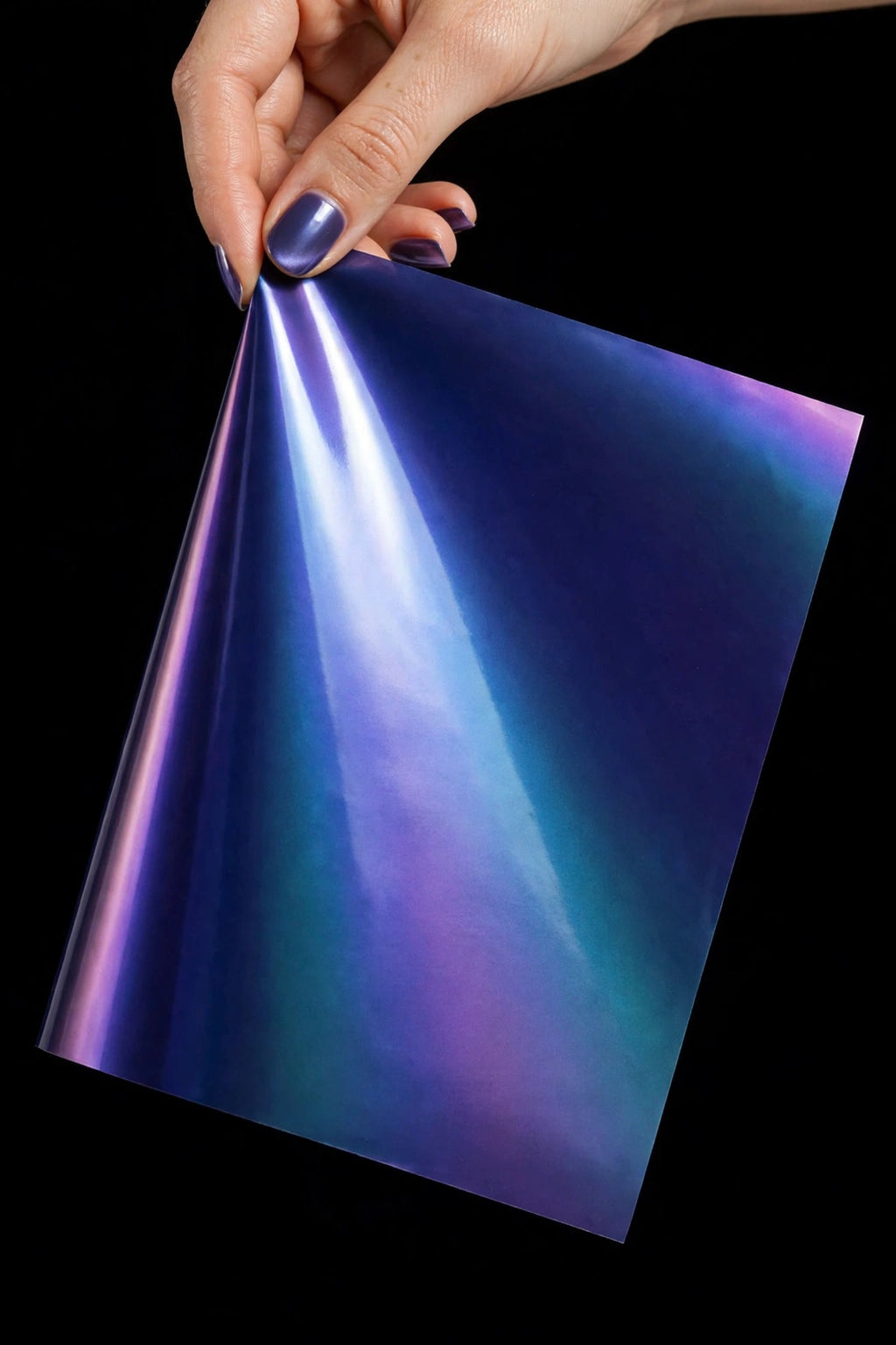 Super Gloss Indigo Bunting vinyl wrap film sheet held in hand