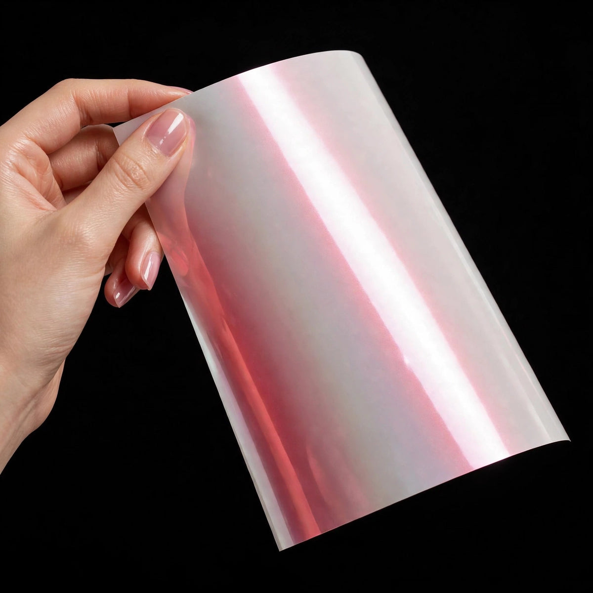 Super Gloss White Red vinyl wrap film sheet held in hand