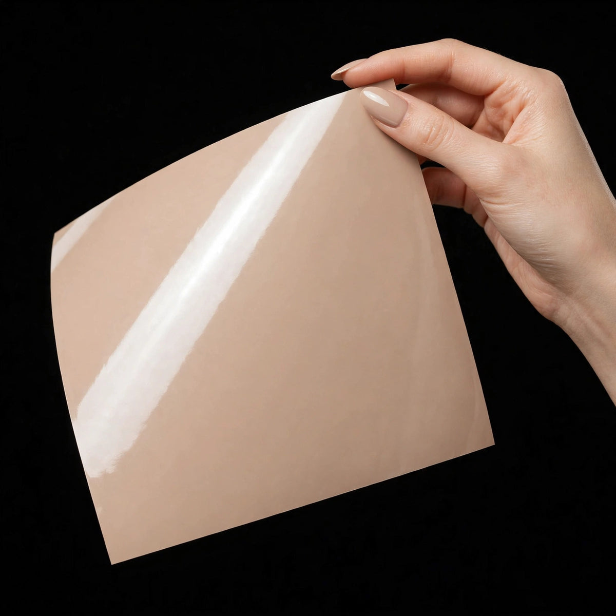 Super Gloss Milk Tea vinyl wrap film sheet held in hand