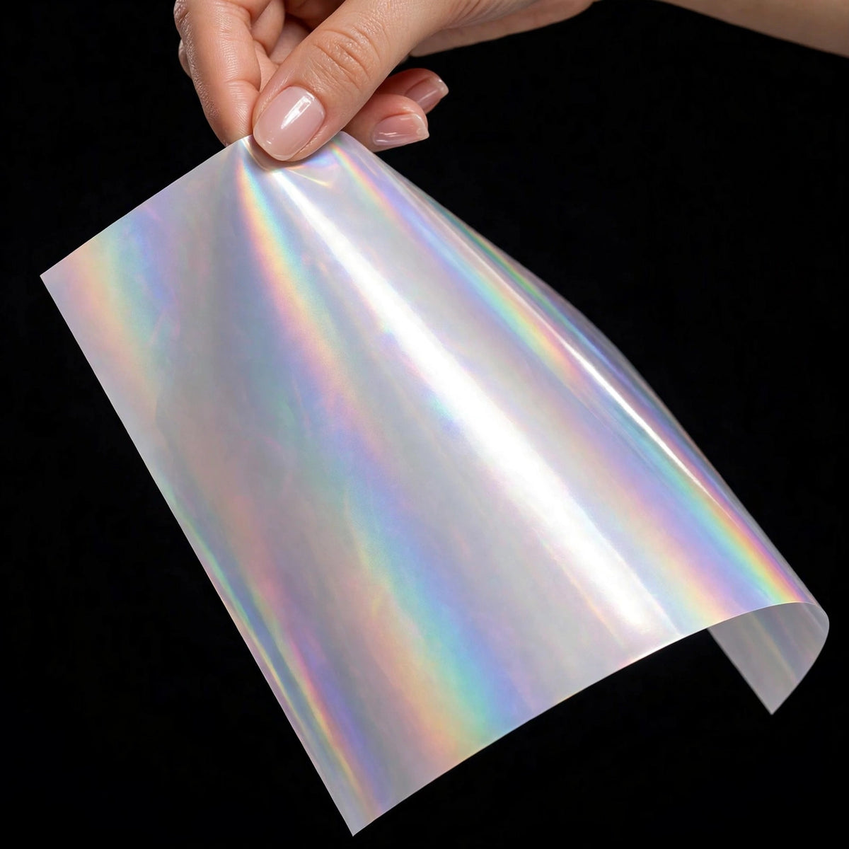 Super Gloss Iridescent Psychedelic White vinyl wrap film sheet held in hand