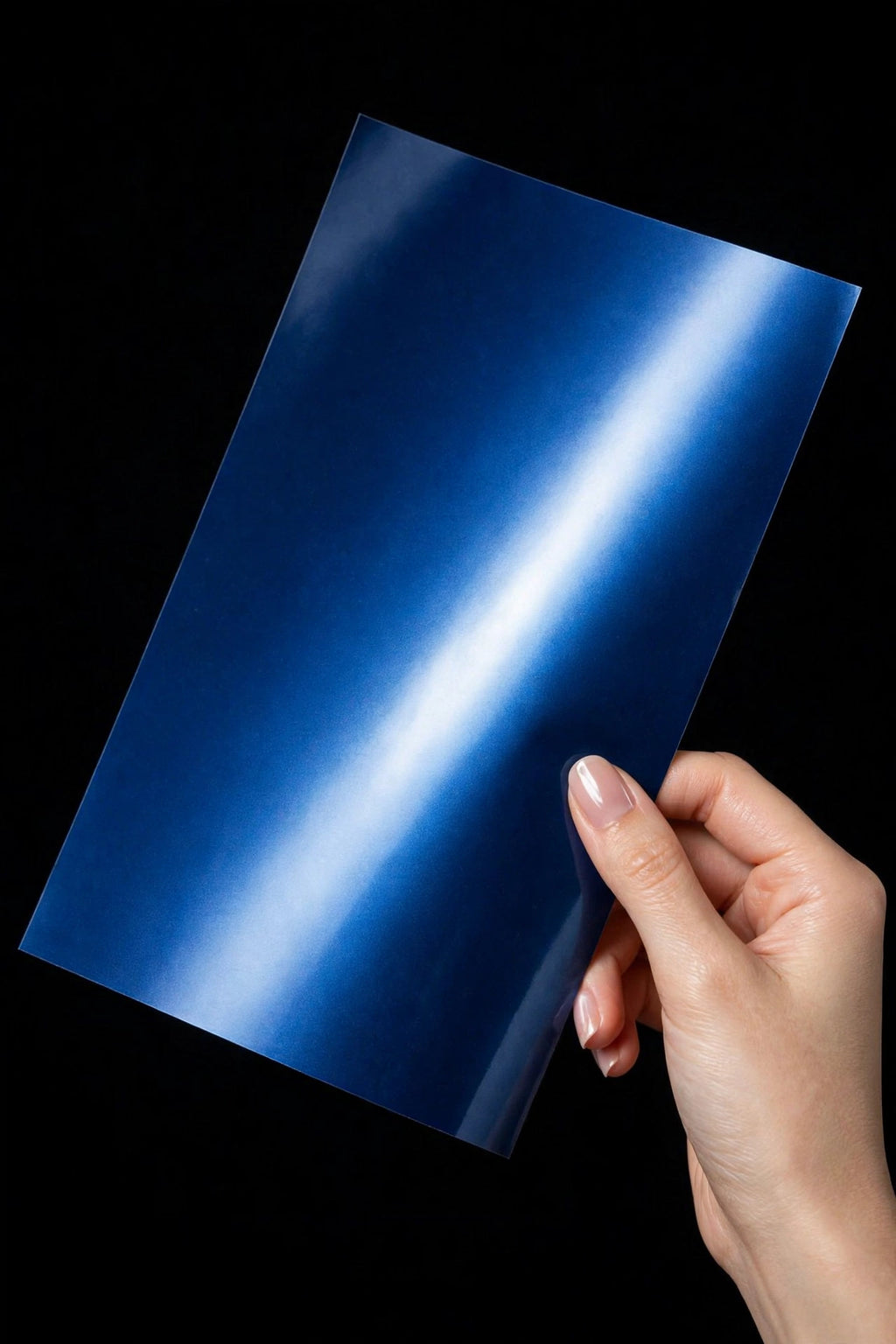 Super Gloss Galaxy Blue Metallic vinyl wrap film sheet held in hand