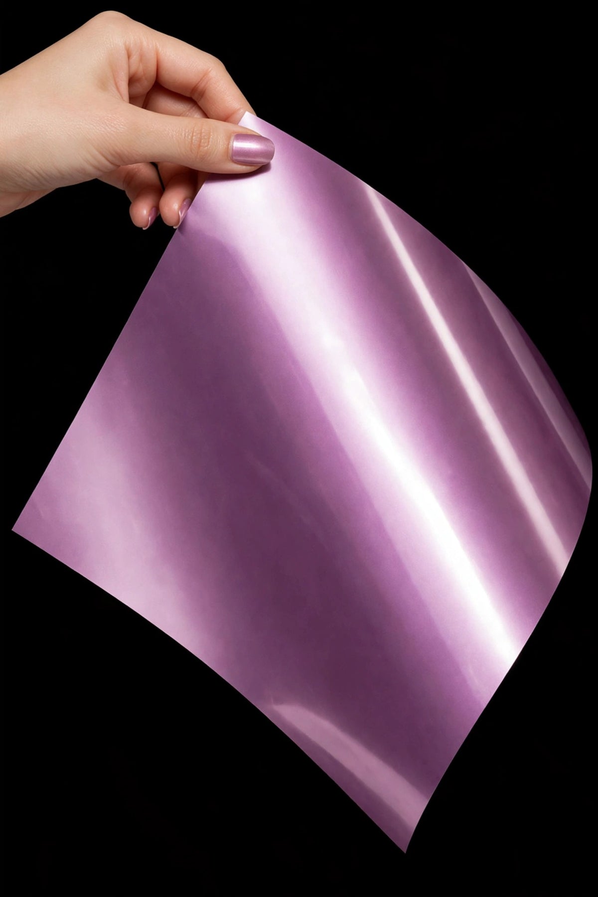 Super Gloss Radiant Purple vinyl wrap film sheet held in hand