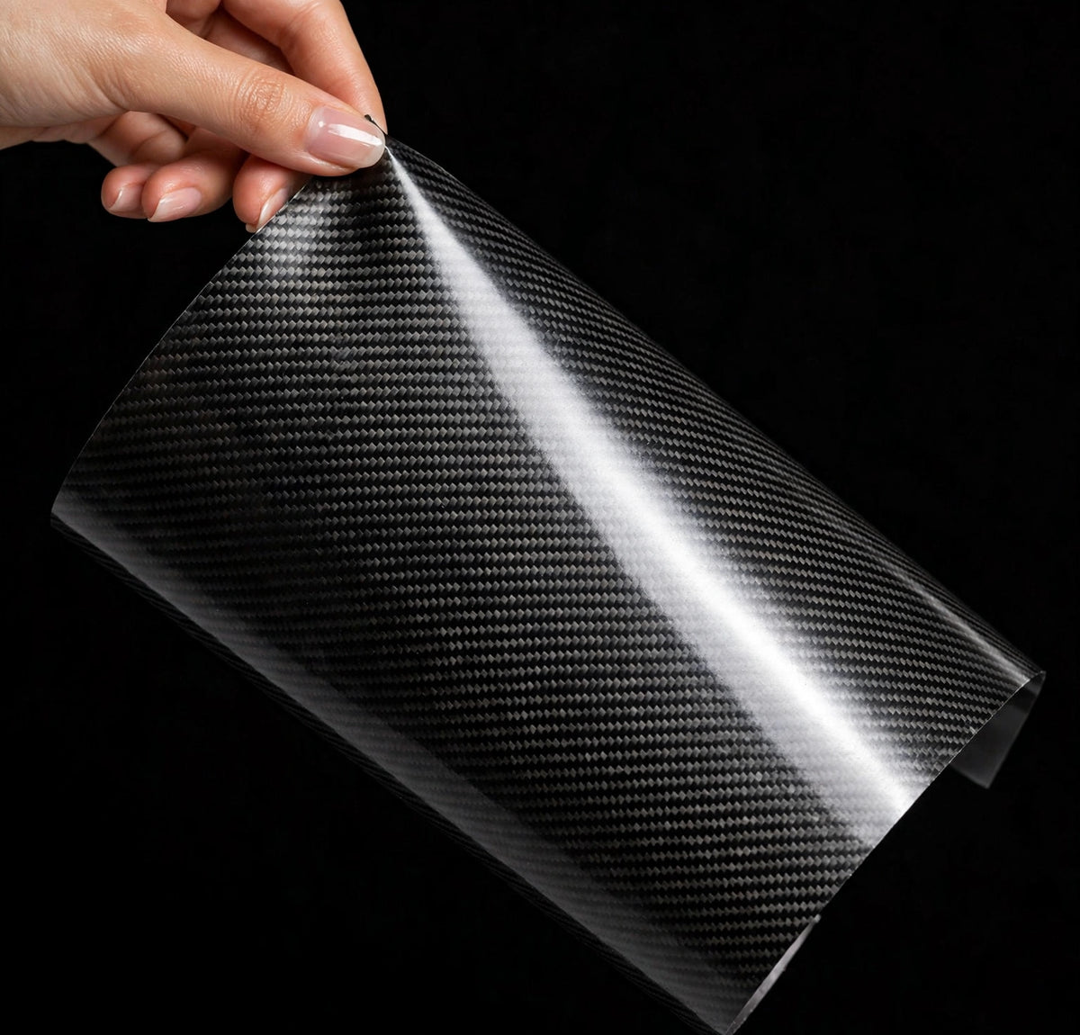 6DUltra Carbon Fiber Black Silver vinyl wrap film sheet held in hand